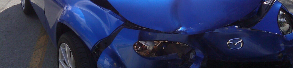 Image of a Mazda after a Fender Bender. Image by rhonda_jenkins.